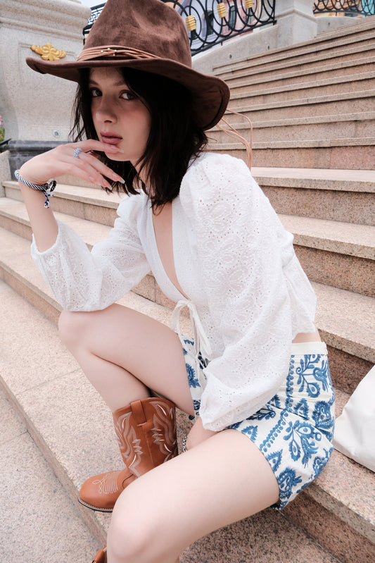 Eyelet Tie-Front Peplum Top